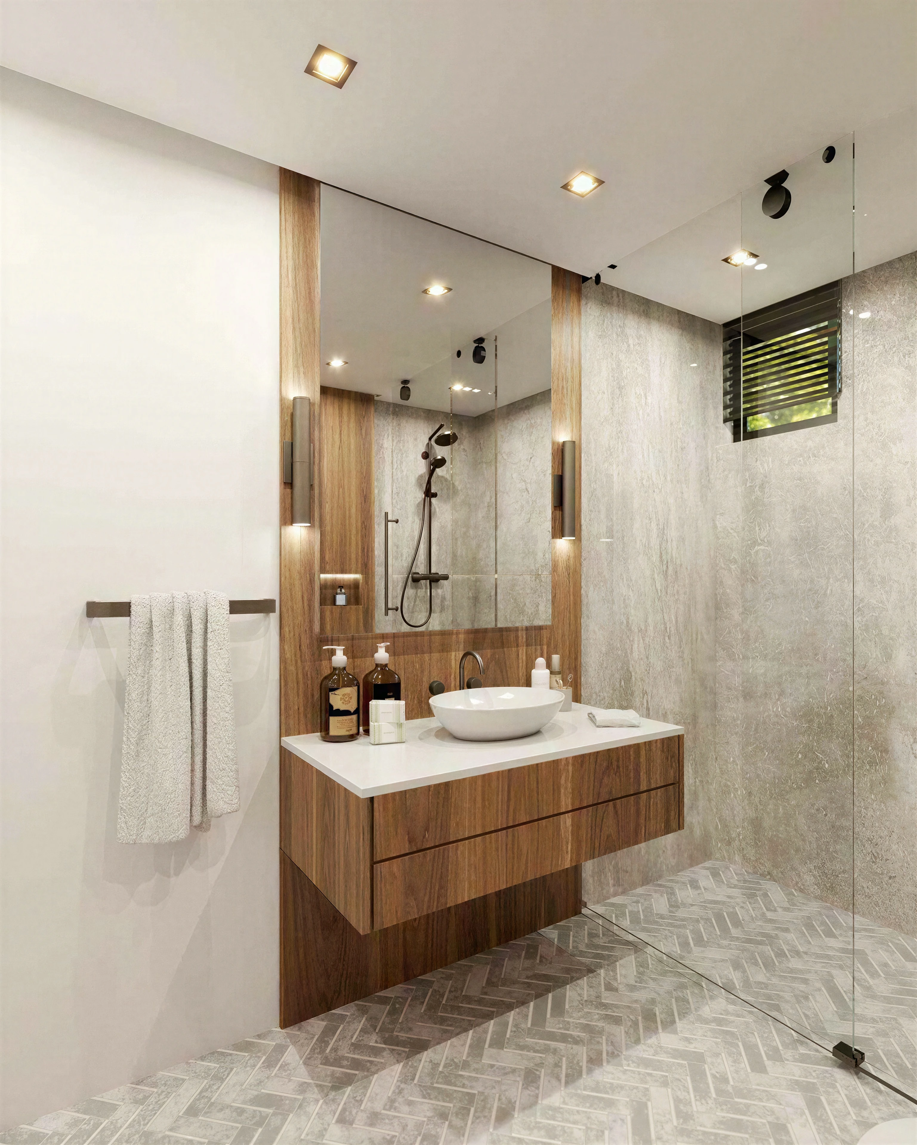 Floating bathroom vanity with a tall illuminated mirror.