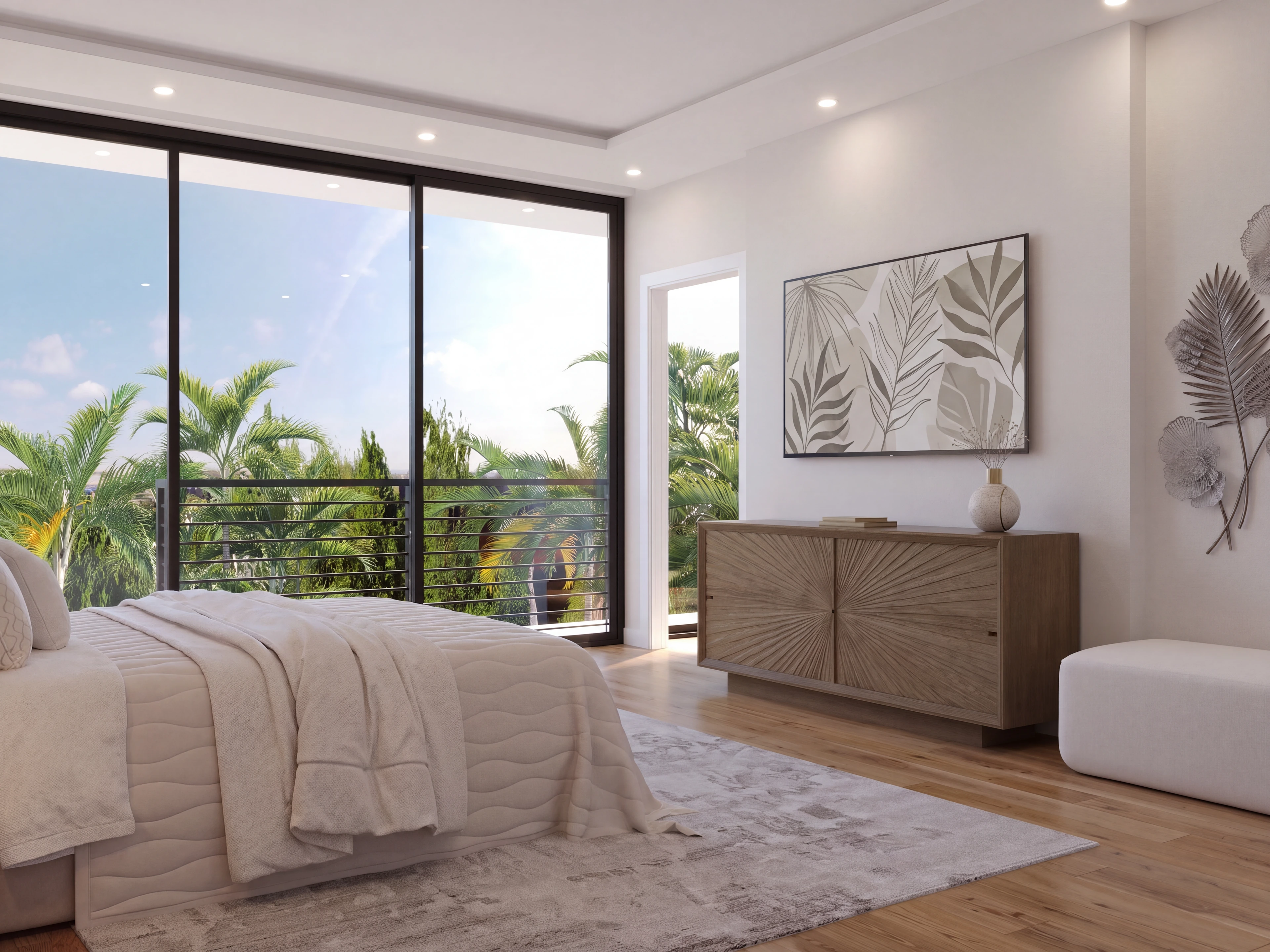 Bedroom with a television wall and large glass doors.
