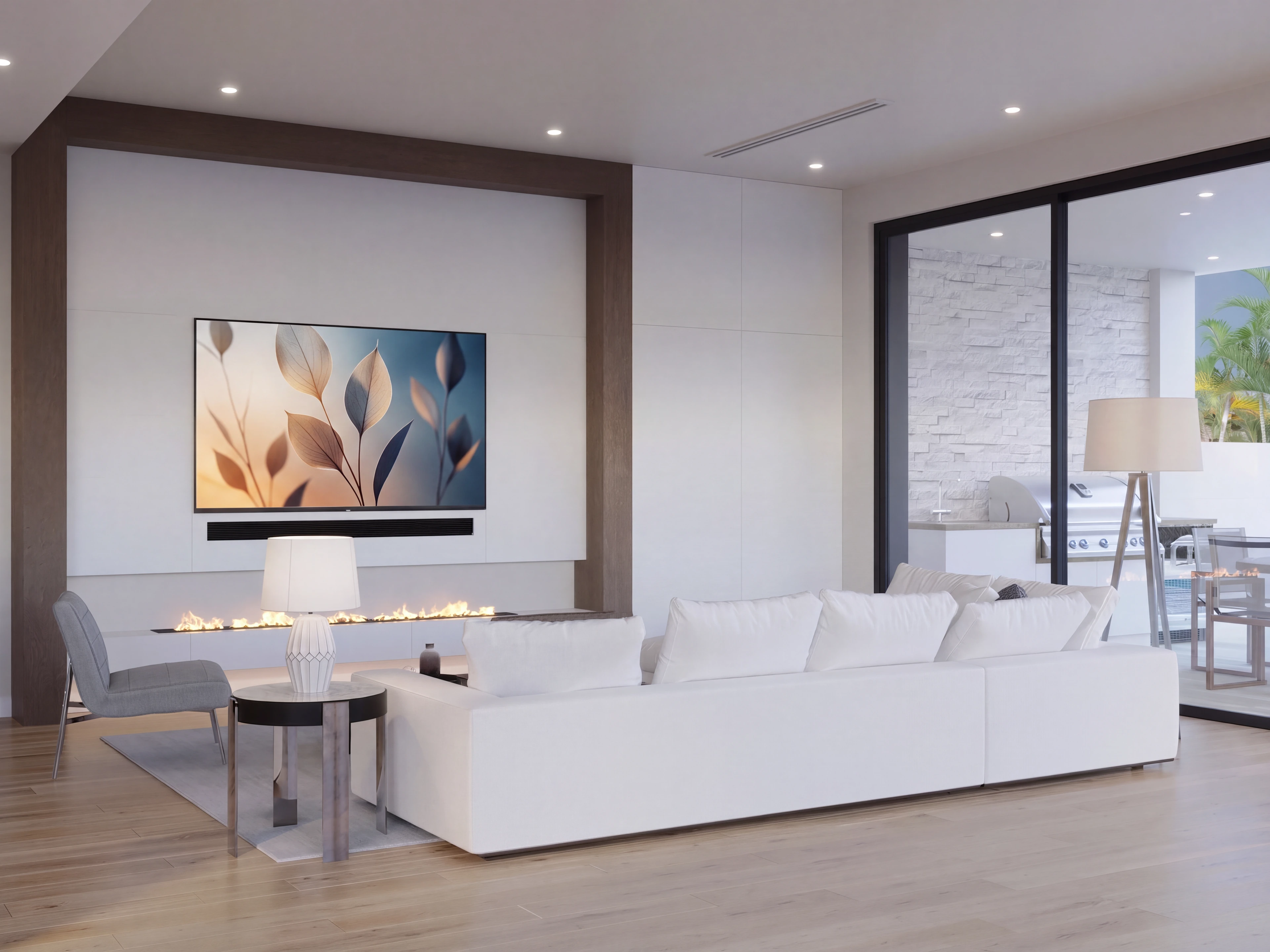 Living room with a sectional sofa and recessed lighting.