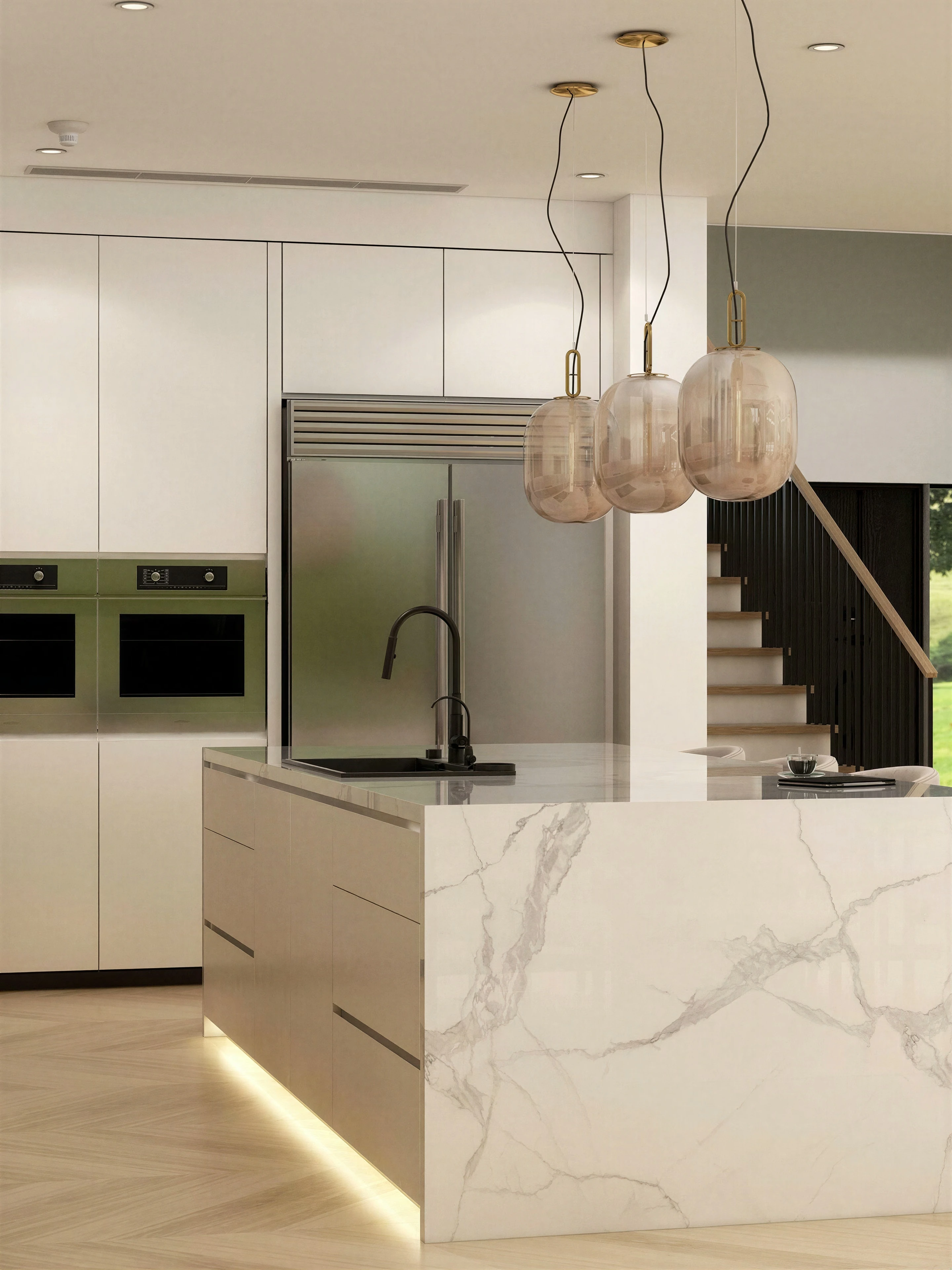 End view of the stone kitchen island and pendant lights.