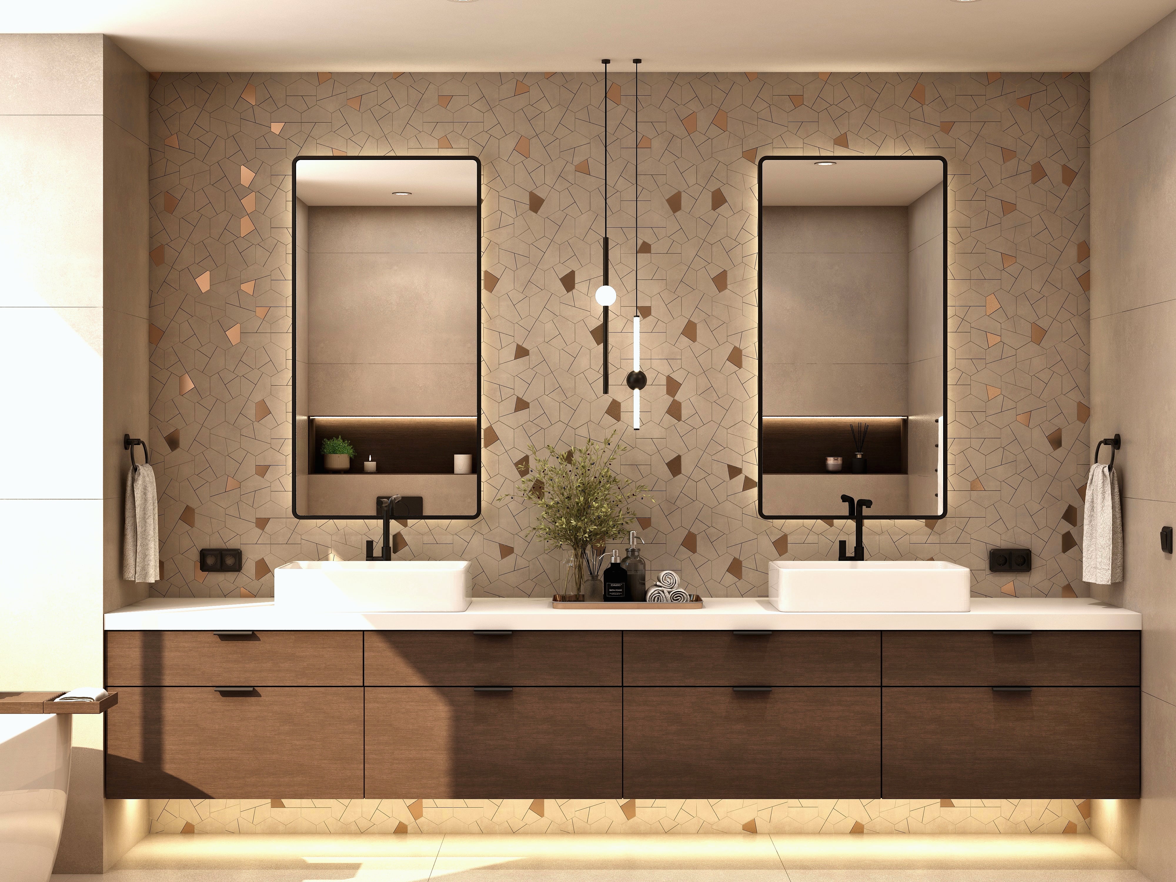 Double bathroom vanity beneath two framed mirrors.