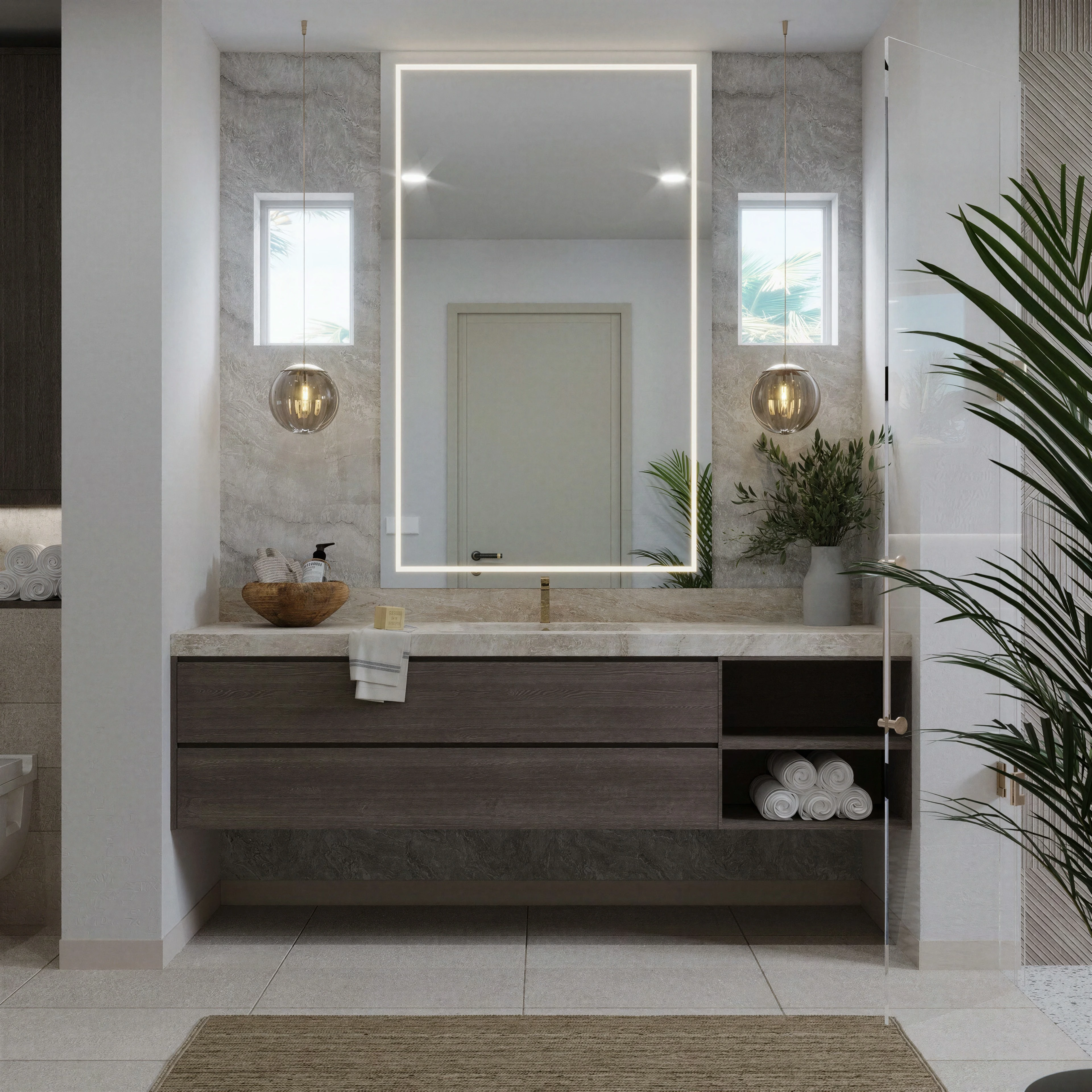 Bathroom vanity with a broad mirror and pendant lighting.