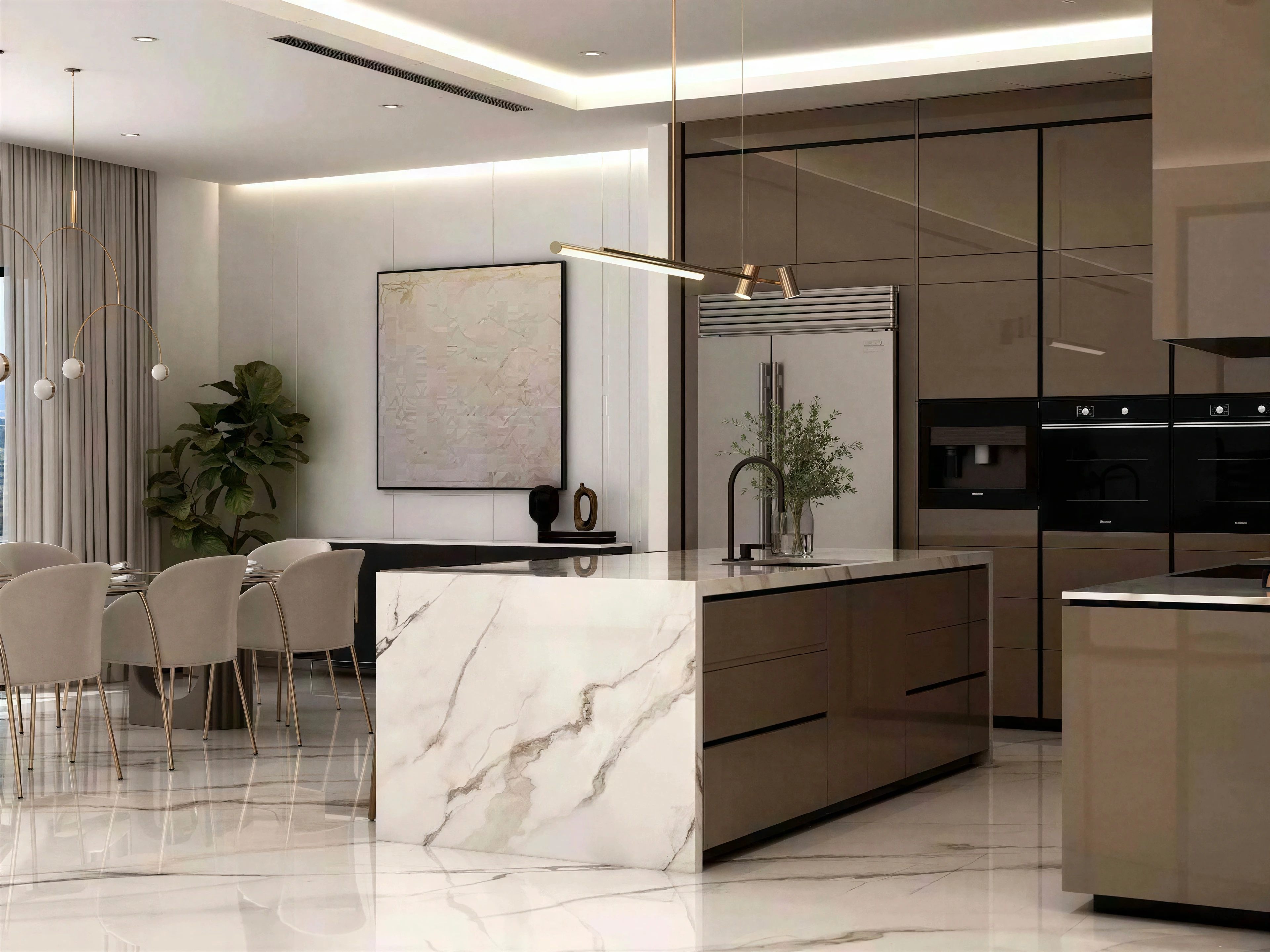 Stone island viewed toward tall cabinetry and integrated appliances.