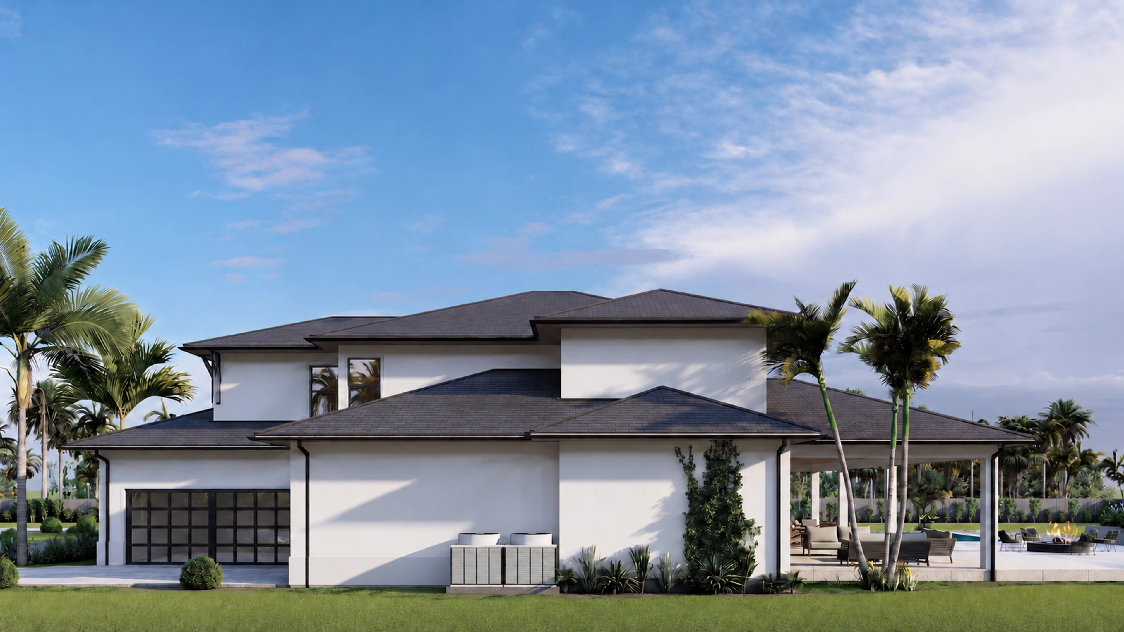 Garage-side elevation with a driveway and landscaped beds.