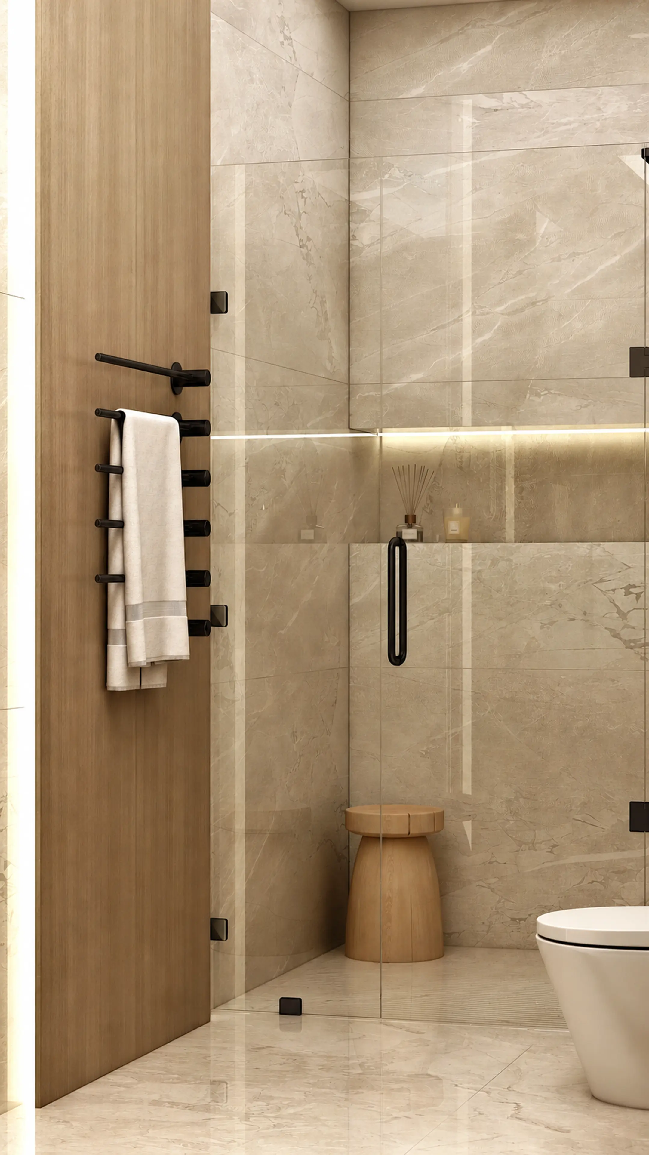 Compact shower enclosure with pale tile and black fittings.