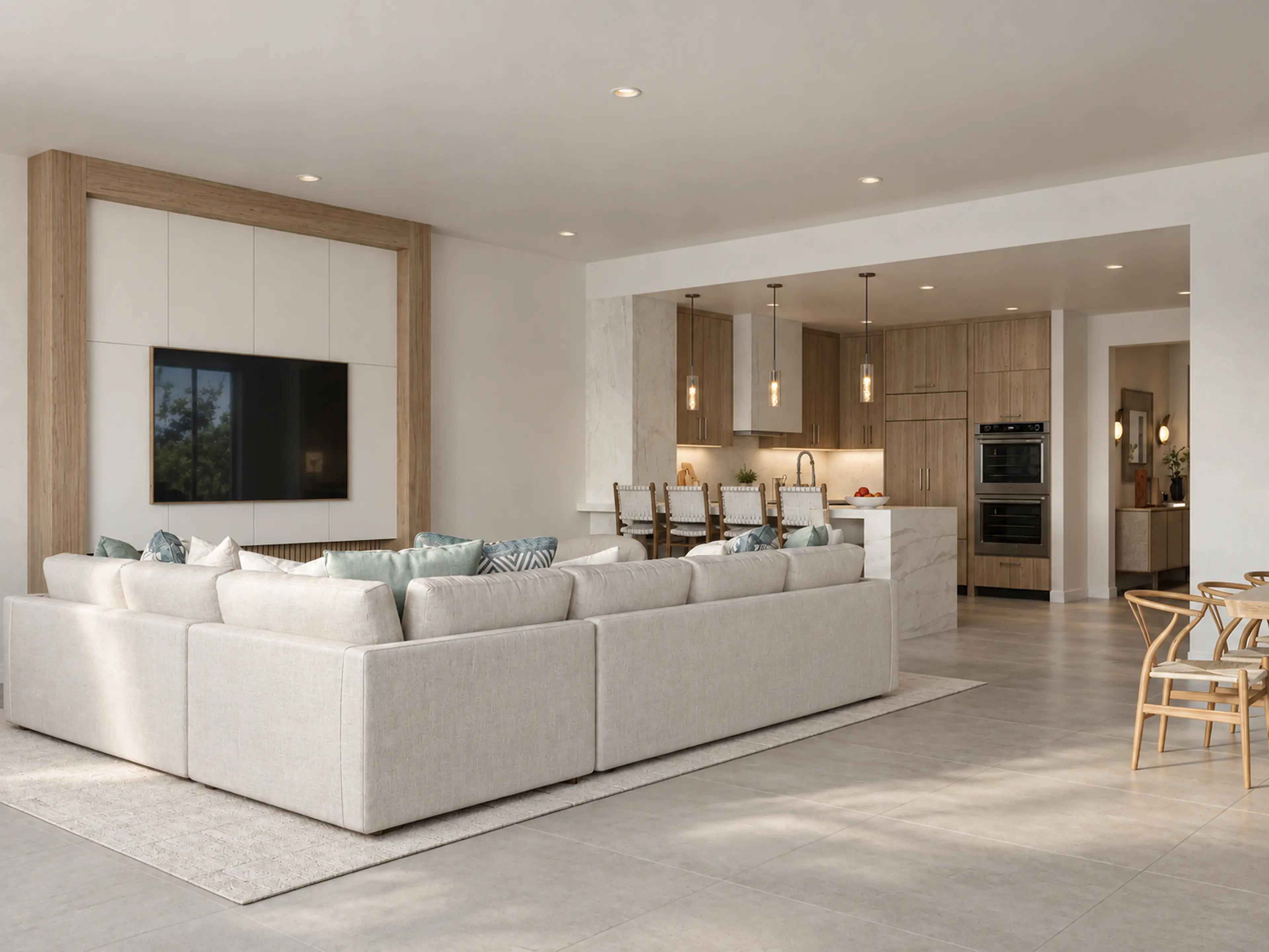 Open living area with a pale sectional sofa.