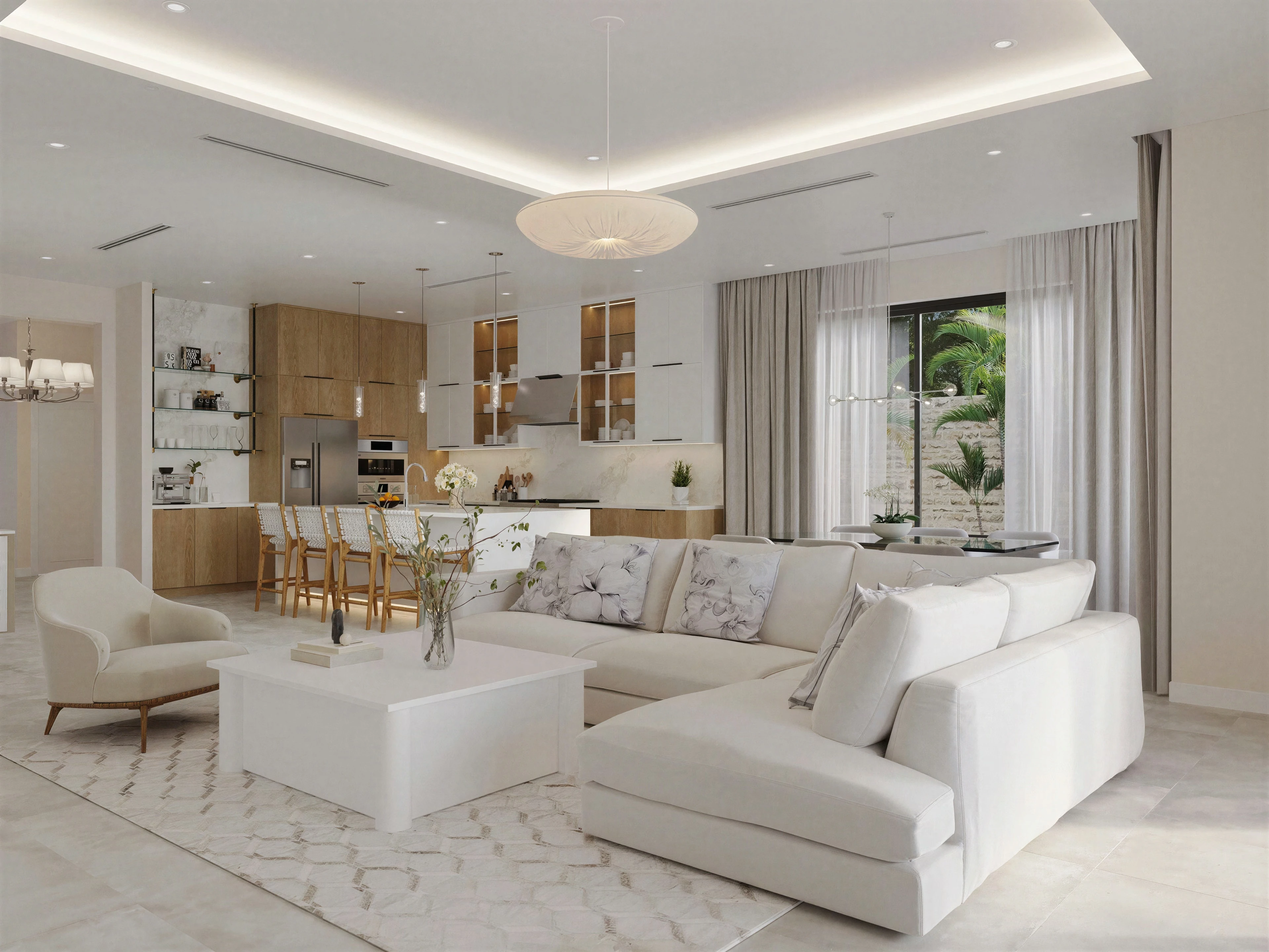Open living room with a white sectional and dining area beyond.