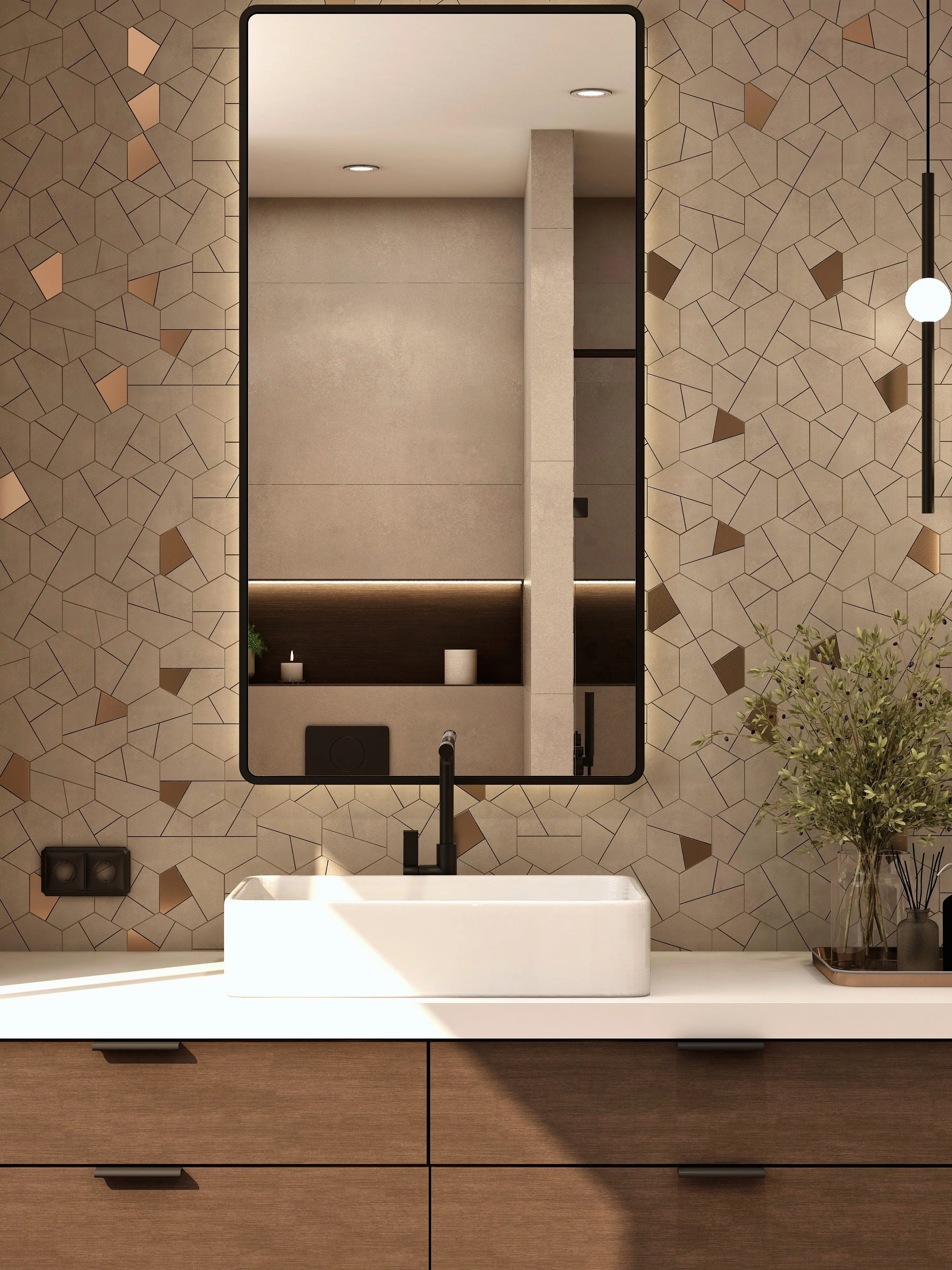Close view of a vessel basin and framed bathroom mirror.