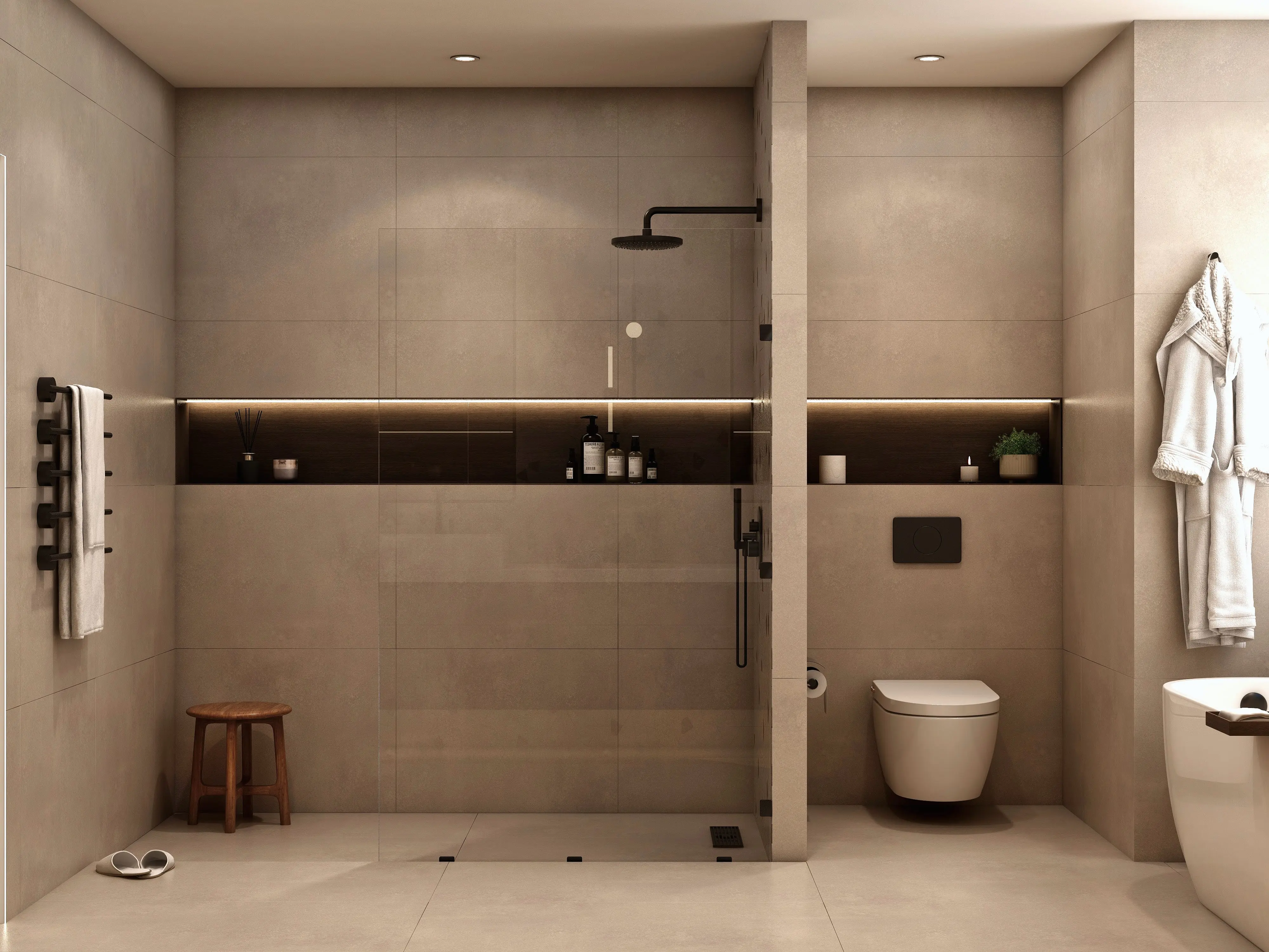 Shower and toilet area with pale tiled walls in the Highland Beach bathroom.